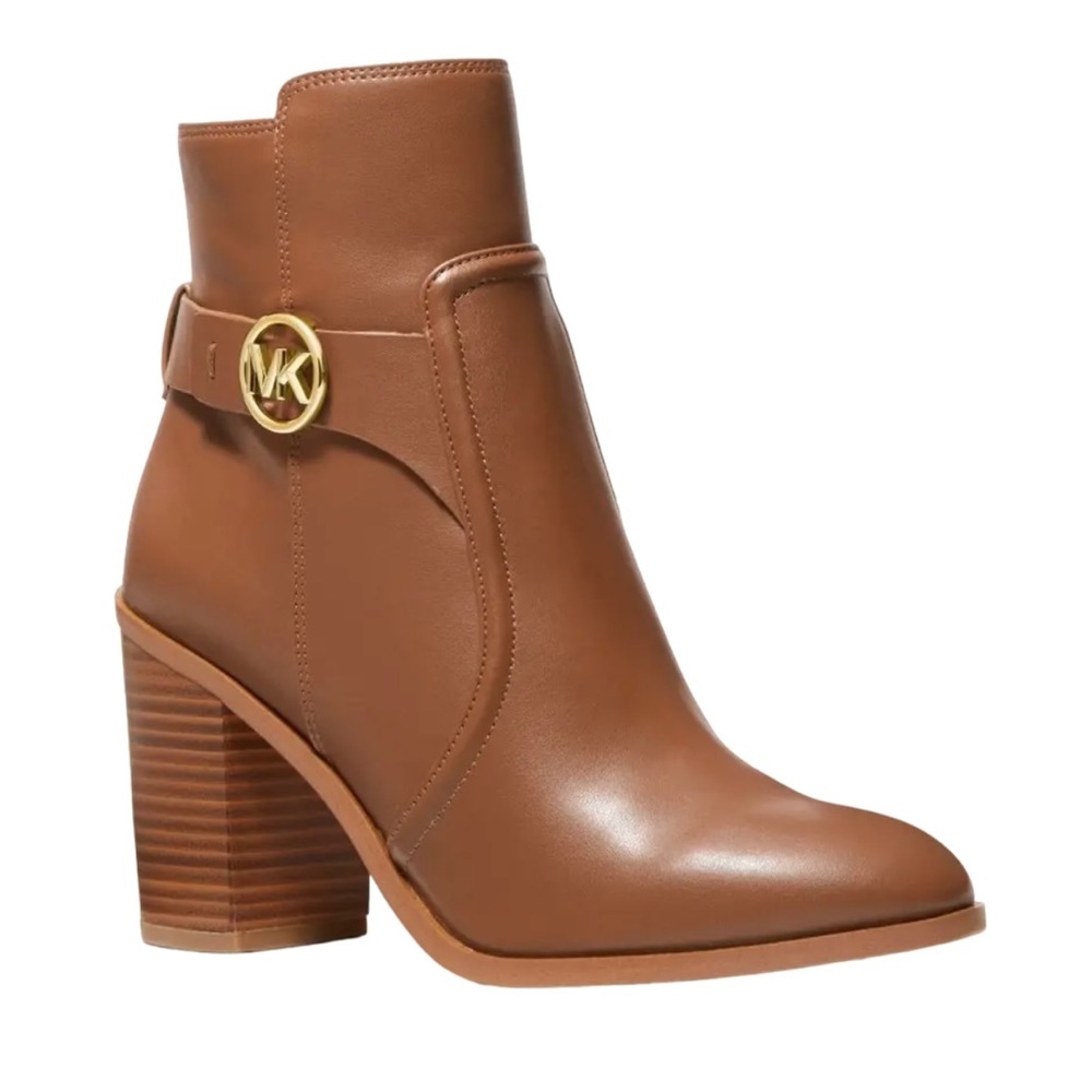 Carmen Heeled Ankle Faux Leather Bootie in Brawn MFSRP: $295.00
Brand new in box